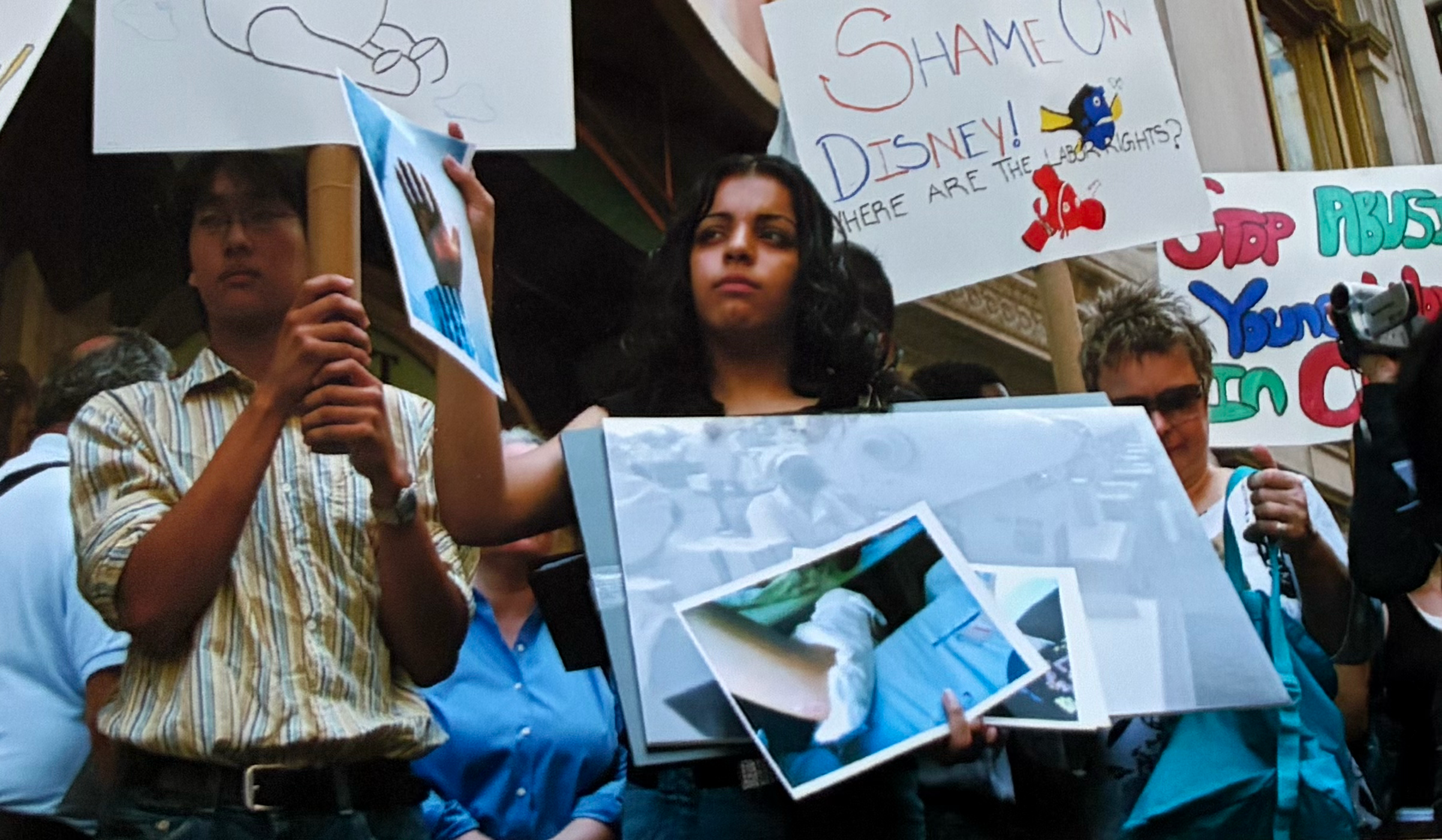 Joy demonstrating in support of human rights and fair labor practices in New York City in 2005